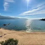 Pieds Dans L'Eau, Sur Une Plage